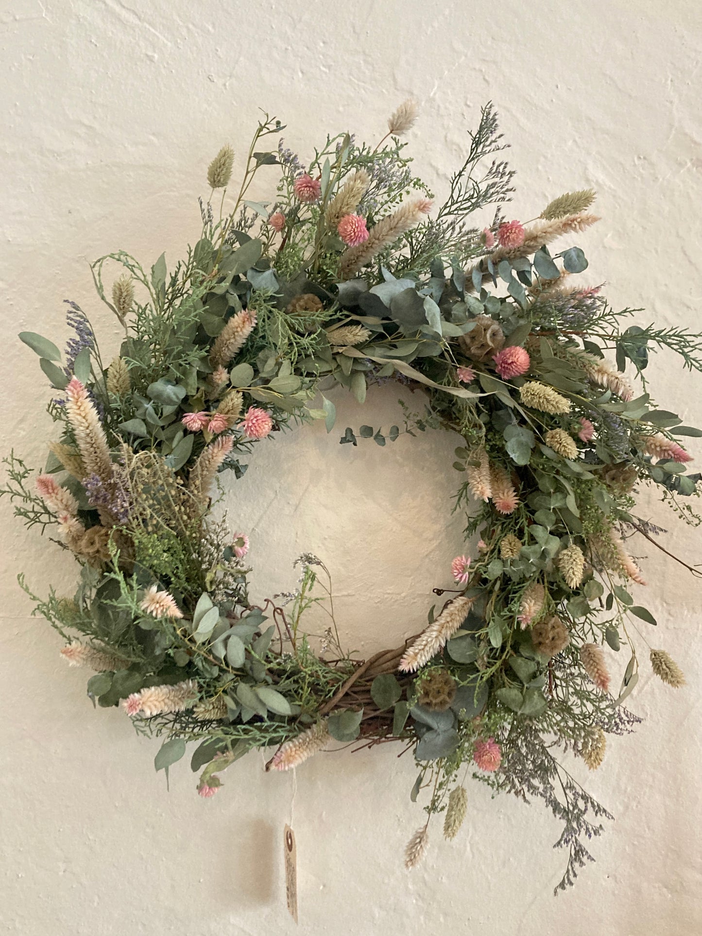 18" pale pink flowers with eucalyptus wreath