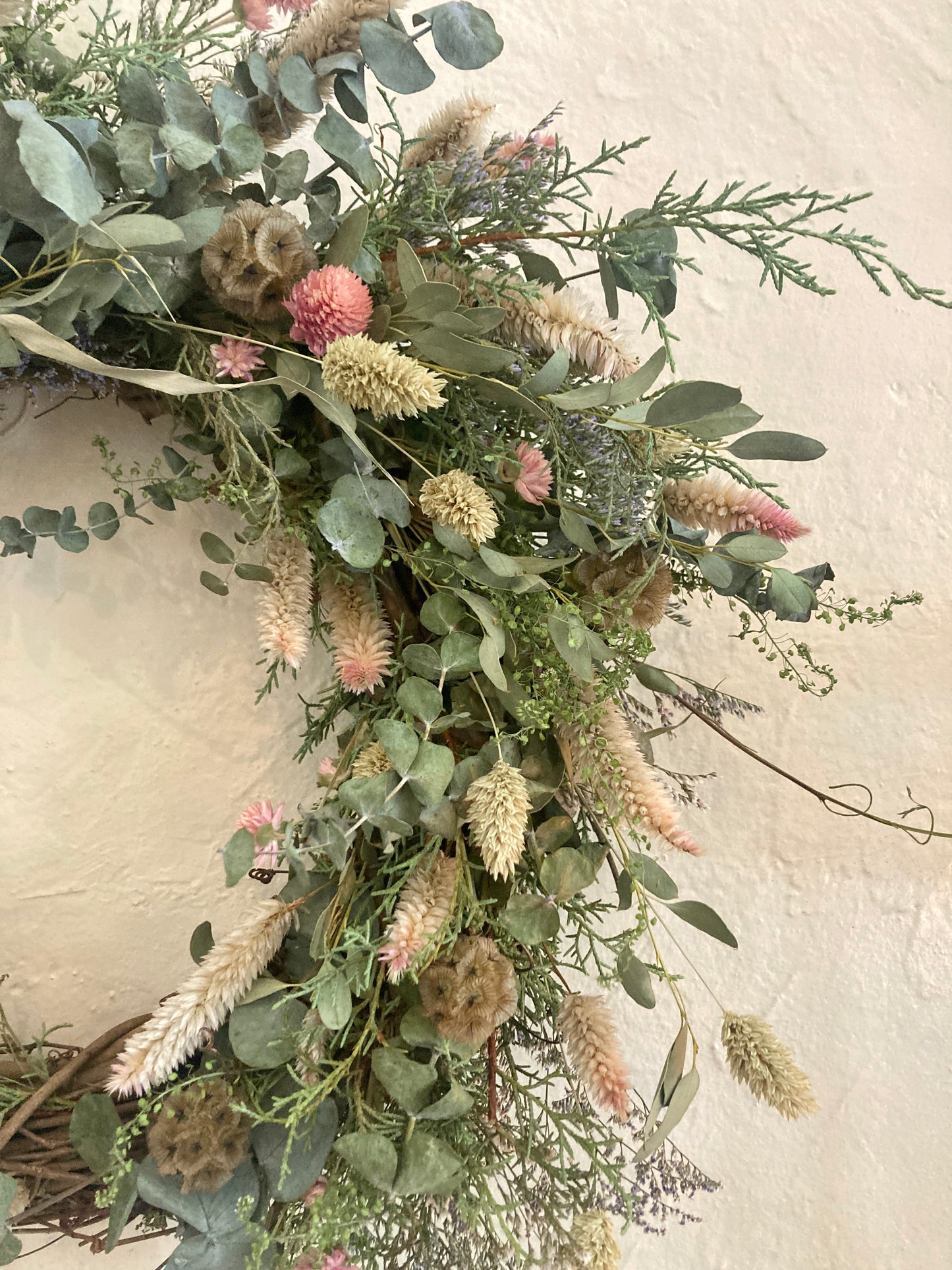 18" pale pink flowers with eucalyptus wreath